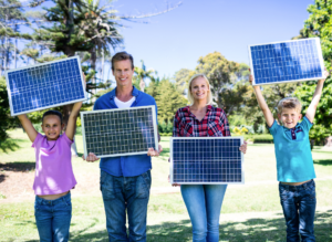 family holding residential solar panels in nj